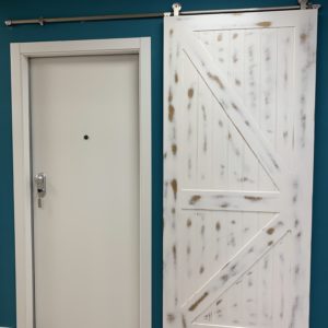 Puerta de Granero con guía en Inox